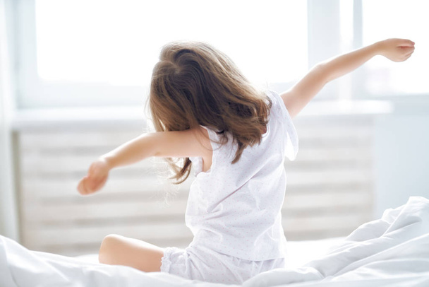 Child is waking up from sleep. - Foto, imagen