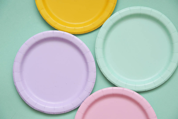 Colorful paper plates on light background. - Photo, Image