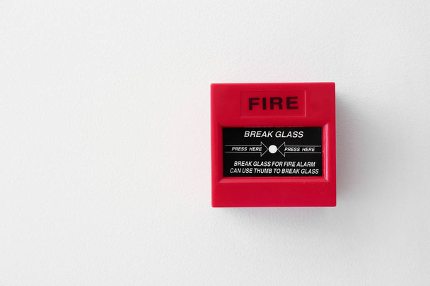 Modern manual call point of fire alarm system on light wall - Photo, Image