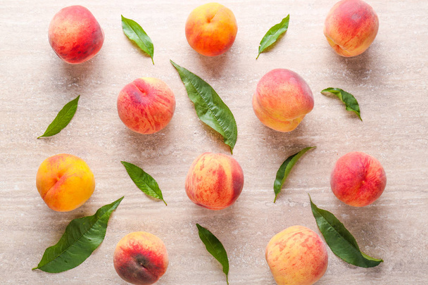 Ripe peaches on grey background - Photo, Image