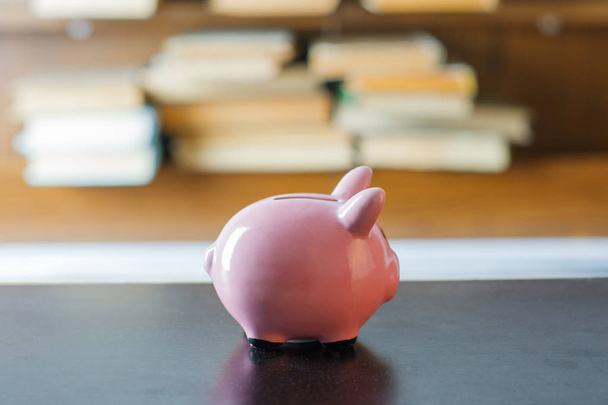 Pig money box on table - Fotoğraf, Görsel