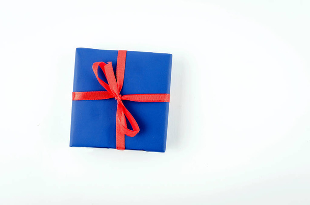 red, blue and white gift boxes with ribbons on a white backgroun - Photo, image
