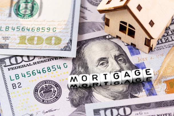 kelime Mortgage ve sembol ev ile bloklarda closeup kavramı - Fotoğraf, Görsel