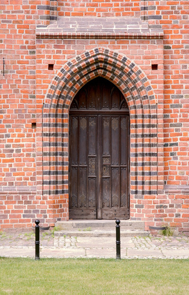 Wooden door to the Gothic church - Photo, Image