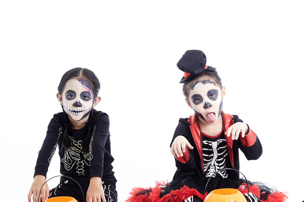 children trick or treating on white background - Photo, Image