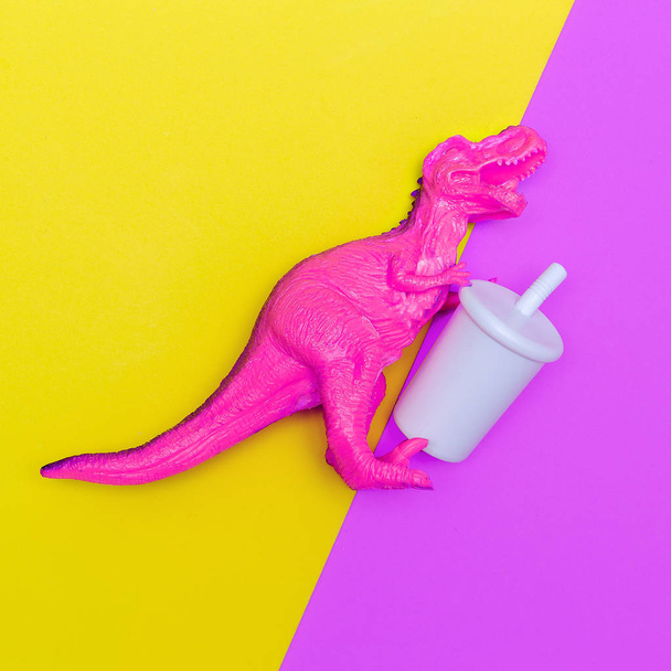 Dinosaur and soda. Minimal flat lay art - Foto, Imagen
