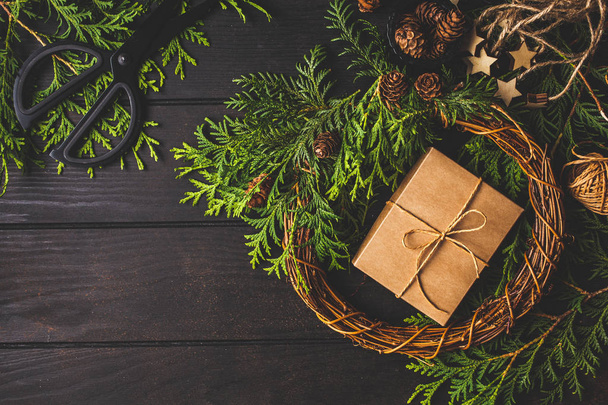 Christmas composition on dark background. Christmas wreath - Zdjęcie, obraz