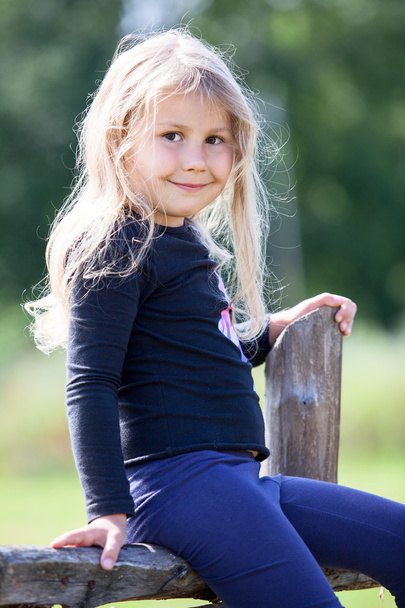 Beautiful little girl, summer day - Foto, imagen
