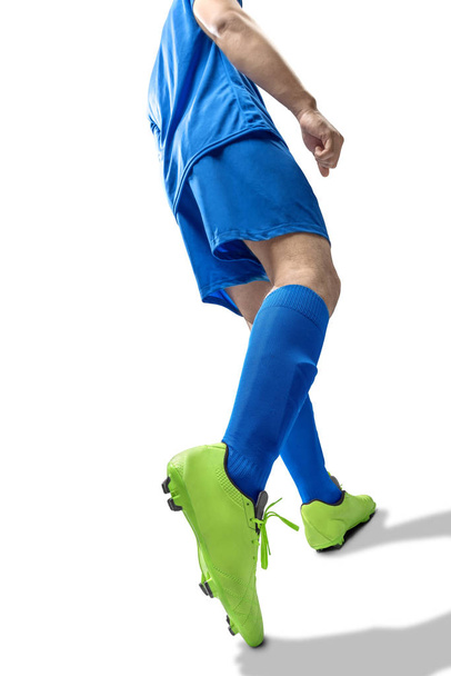 Rear view of football player man in the pose of kicking the ball - Foto, Bild