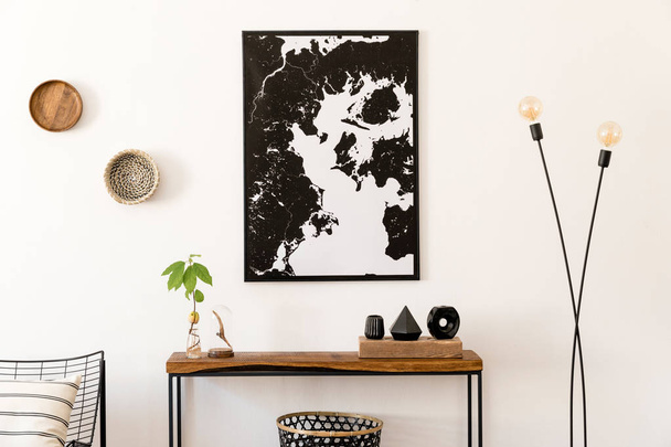 Design scandinavian interior of living room with wooden console, rings on the wall, vases , hourglass and elegant personal accessories. Stylish mock up poster map. Modern home decor. Template. - Photo, Image