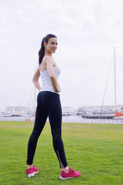Young beautiful woman jogging on morning - Photo, image