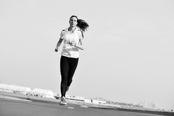 woman jogging at morning - Fotoğraf, Görsel