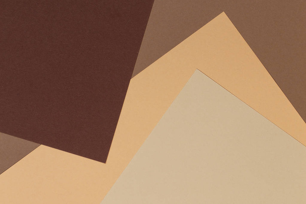 Color papers geometry composition banner background with beige, light brown and dark brown tones. - Photo, Image