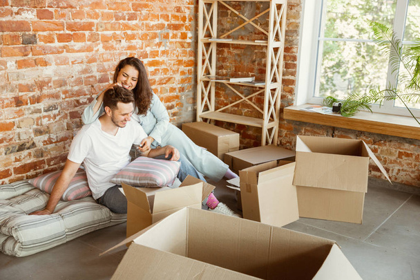 Young couple moved to a new house or apartment - Photo, image