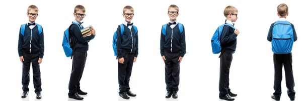 Schoolboy in uniform with backpack on white background in differ - Photo, Image