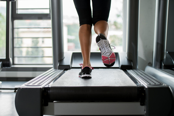 Exercising on a treadmill - Фото, изображение