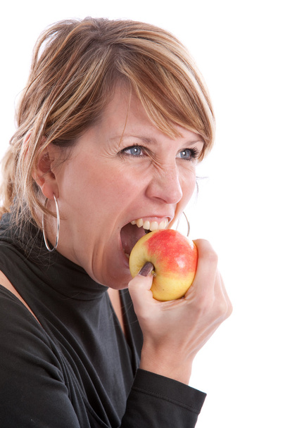 Biting in an apple - Photo, image