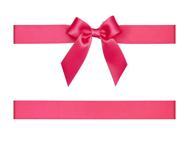 Pink bow tied using silk ribbon, cut out top view - Photo, Image