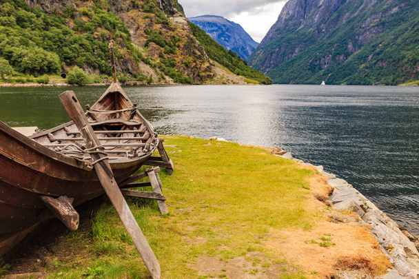 Old viking boat on fjord shore, Norway - Zdjęcie, obraz