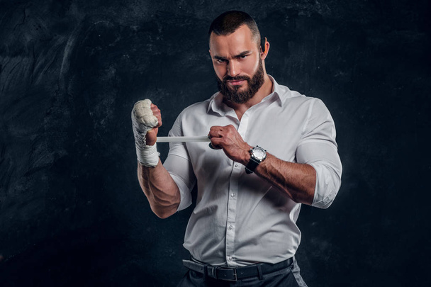 Portrait of cheeky bearded man with boxing gloves - Photo, Image