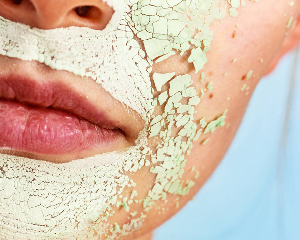 Girl with mud mask on face - Φωτογραφία, εικόνα