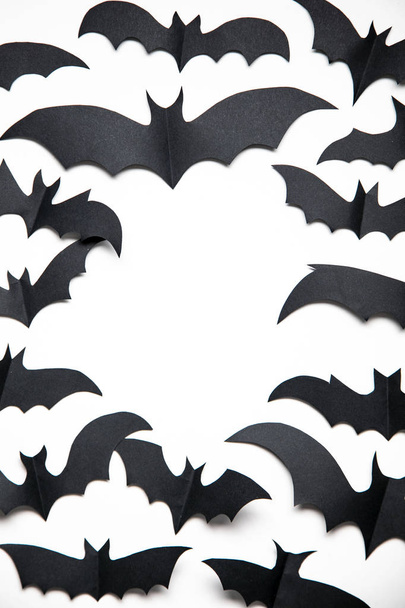 Halloween paper bat decorations on a white background. - 写真・画像