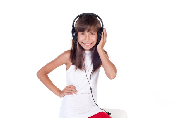 Linda menina feliz bonito com fones de ouvido
 - Foto, Imagem