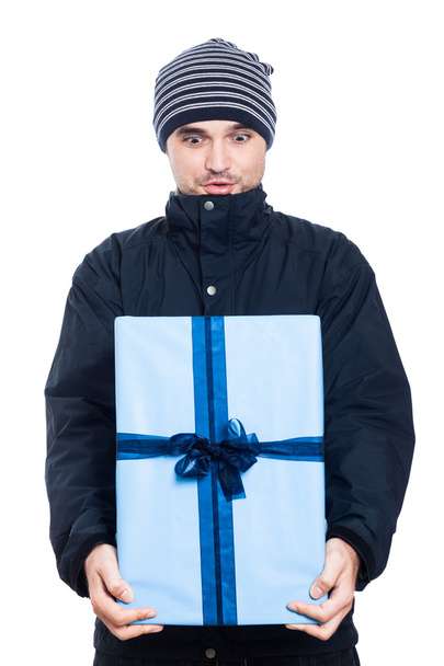 Surprised man with big present - Foto, Bild