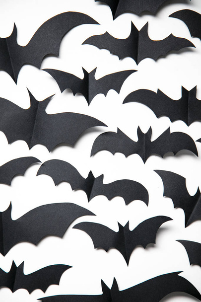 Halloween paper bat decorations on a white background. - Fotografie, Obrázek