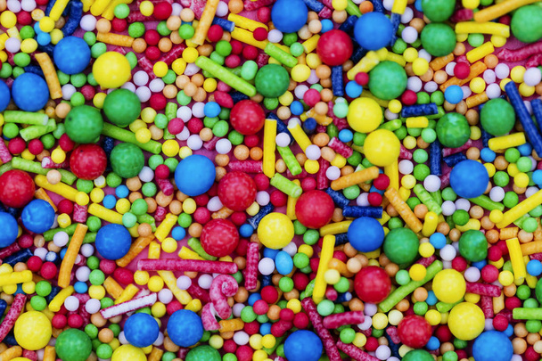 Colorido doce bolo decorativo polvilhas fundo
 - Foto, Imagem