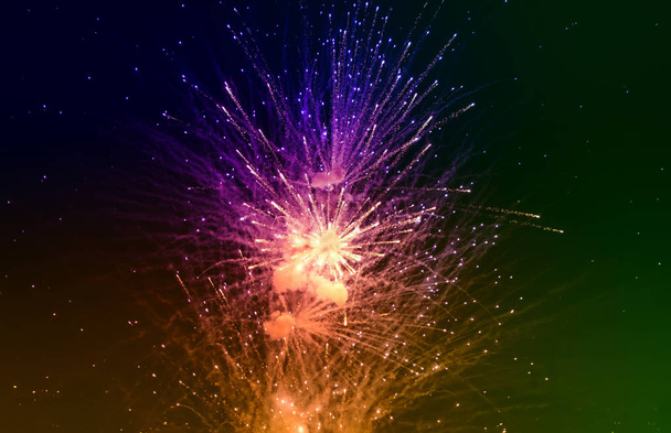 Colorful closeup fireworks light up the sky  - Foto, afbeelding