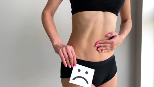 Woman Health. Female Body Holding Sad Smile Card Near Stomach. - Footage, Video
