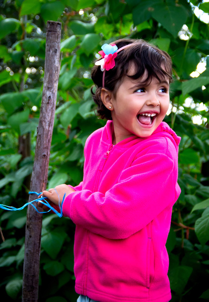 little girl in orchard - Foto, Bild