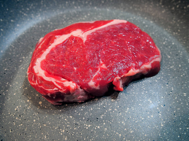 Raw Ribeye Steak In A Pan For Food Advertising - Photo, Image