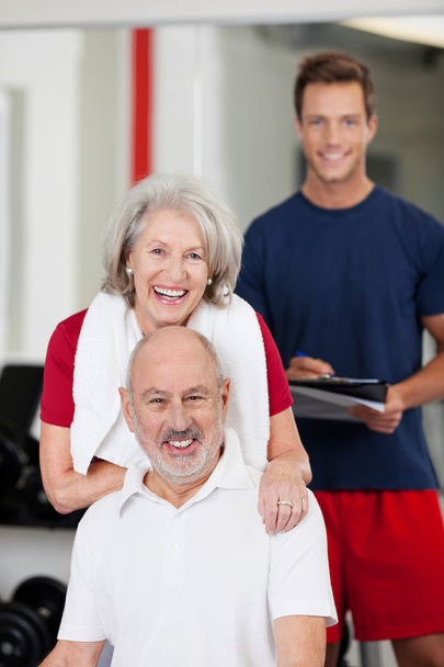 Senior couple with a fitness trainer - Fotoğraf, Görsel