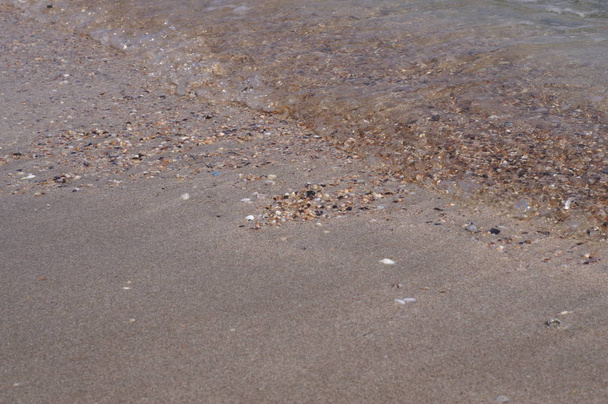 Textura de arena gris. Arena de fondo. Textura perfecta de arena y agua de mar clara
 - Foto, imagen