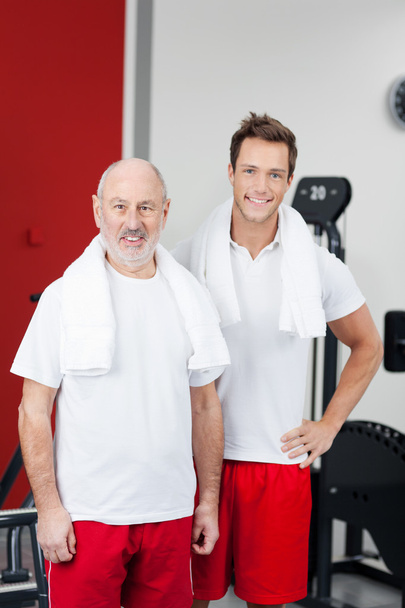 Happy Father And Son Standing At Gym - Φωτογραφία, εικόνα