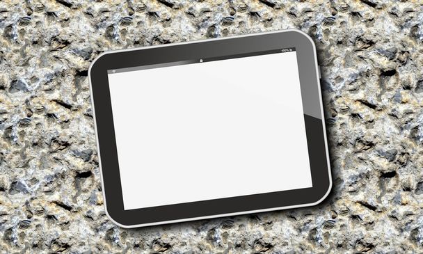 Tablet PC sobre roca volcánica
 - Foto, Imagen