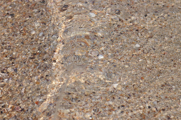 Textura de arena gris. Arena de fondo. Textura perfecta de arena y agua de mar clara
 - Foto, imagen