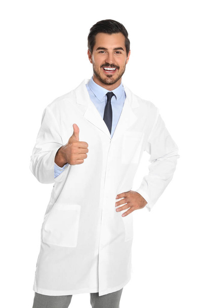 Portrait of young male doctor on white background. Medical service - Foto, afbeelding