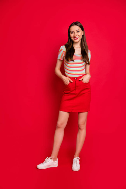 Vertical full length size body photo of pretty lady with beaming toothy smile holding hands in pockets isolated bright background - Foto, immagini