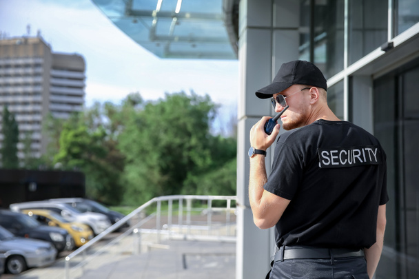 Handsome male security guard outdoors - Photo, Image