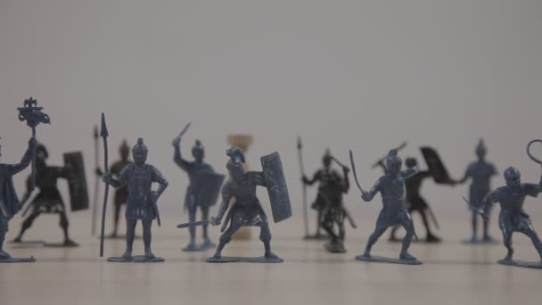close-up footage of plastic toy soldiers on white - Footage, Video