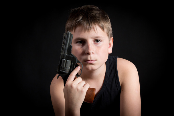 teenager with a gun - Photo, image