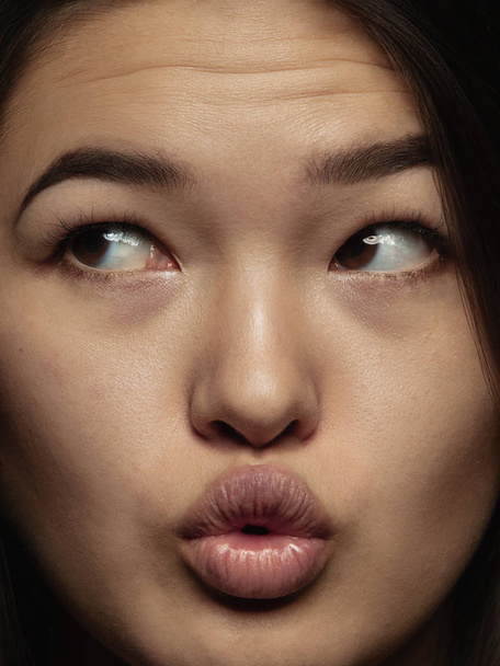 Close up portrait of young emotional woman - 写真・画像
