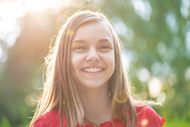 Portrait of teen girl with sun rays - Fotoğraf, Görsel