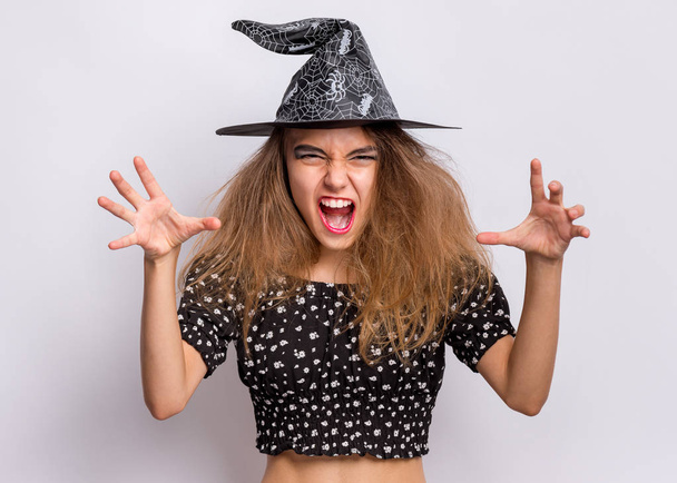 Teen girl in witch black hat - Foto, Imagem