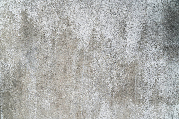 Closeup pale color and peeling of painted white cement wall texture background. - Photo, image