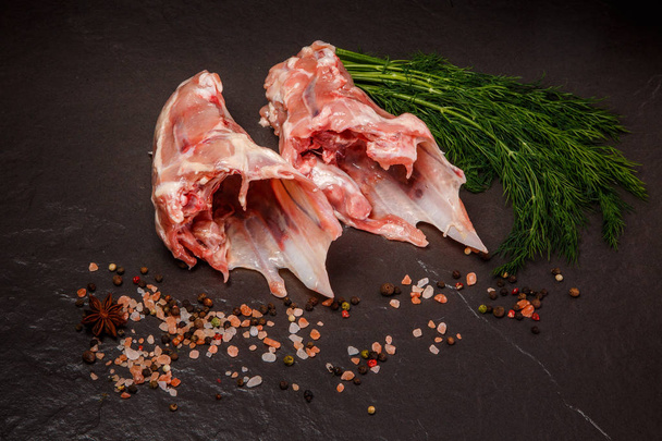 top view on parts of raw chicken with spices and green dill - Fotoğraf, Görsel