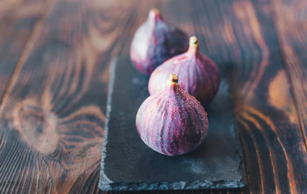 Fresh figs on the stone board - Foto, Imagem
